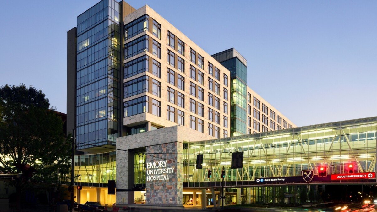 A picture containing text, building, sky, outdoor Description automatically generated