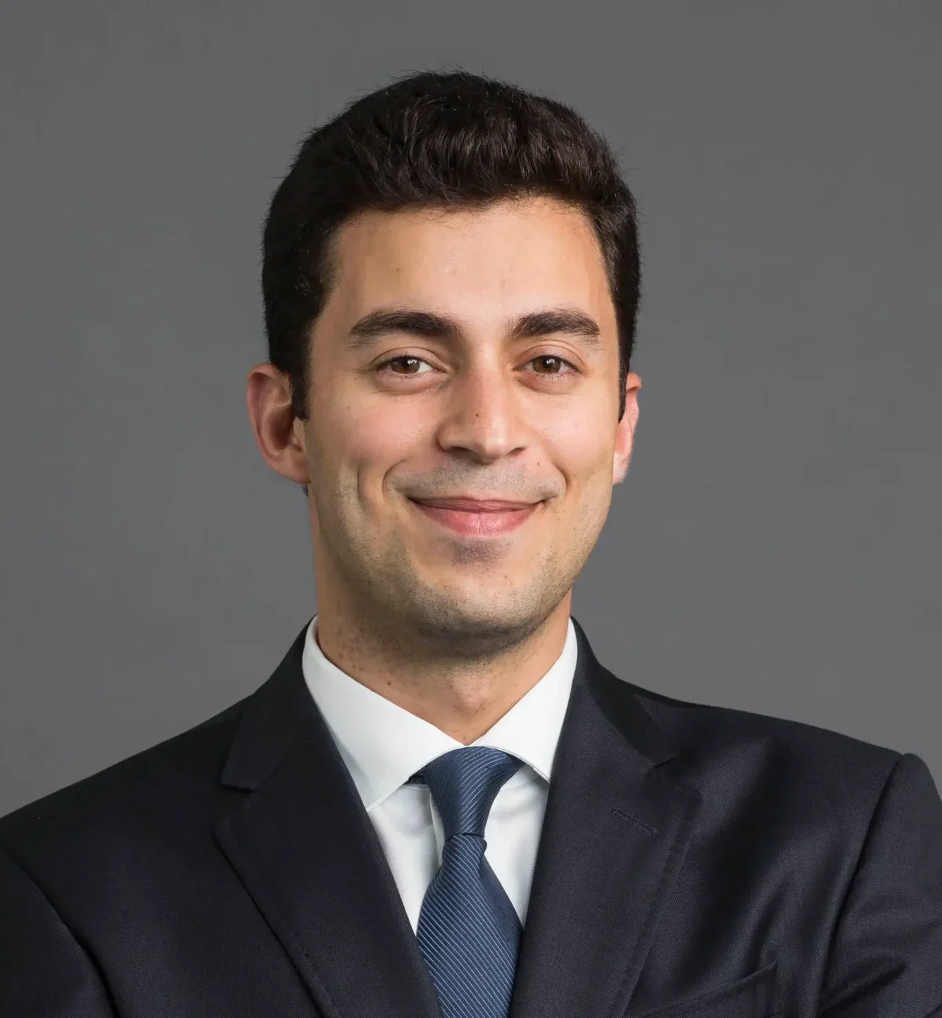 Elie Ramly, MD An image showcasing Elie Ramly, MD, a Plastic Surgery Fellow and General Surgery Graduate from MGH | Harvard Medical School, highlighting his professional journey and achievements.