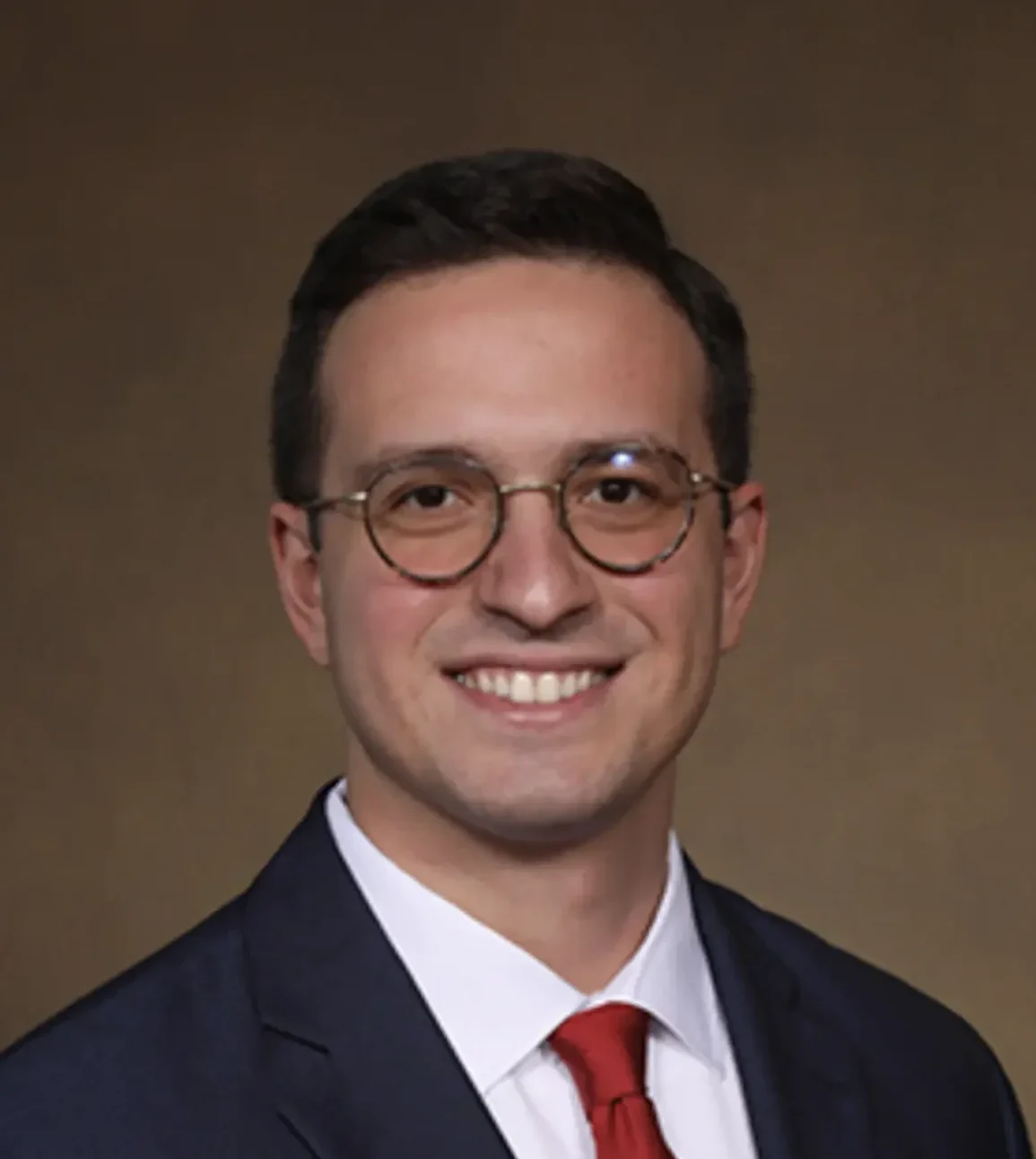 Ioannis (Yiannis) Ziogas, MD An image showcasing Ioannis (Yiannis) Ziogas, MD, a PGY-2 General Surgery Resident at the University of Colorado, highlighting his professional journey and achievements.